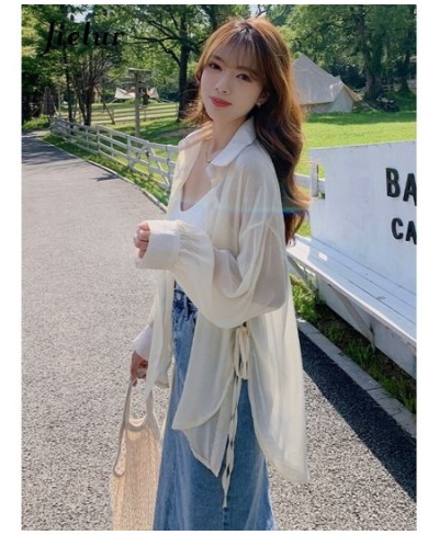 elegant solid color irregular women shirts single breasted loose long sleeve Notched Lace-up summer fashion female shirt $32....