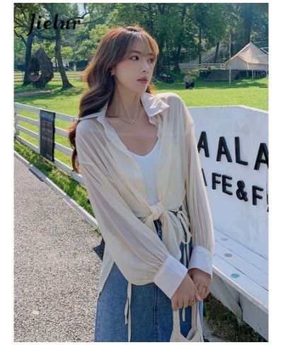 elegant solid color irregular women shirts single breasted loose long sleeve Notched Lace-up summer fashion female shirt $32....